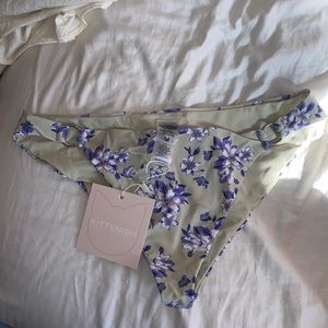 Kittenish bathing suit bottom